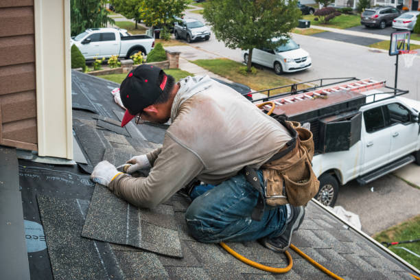 Professional Roofing technician working in Wildrose, ND